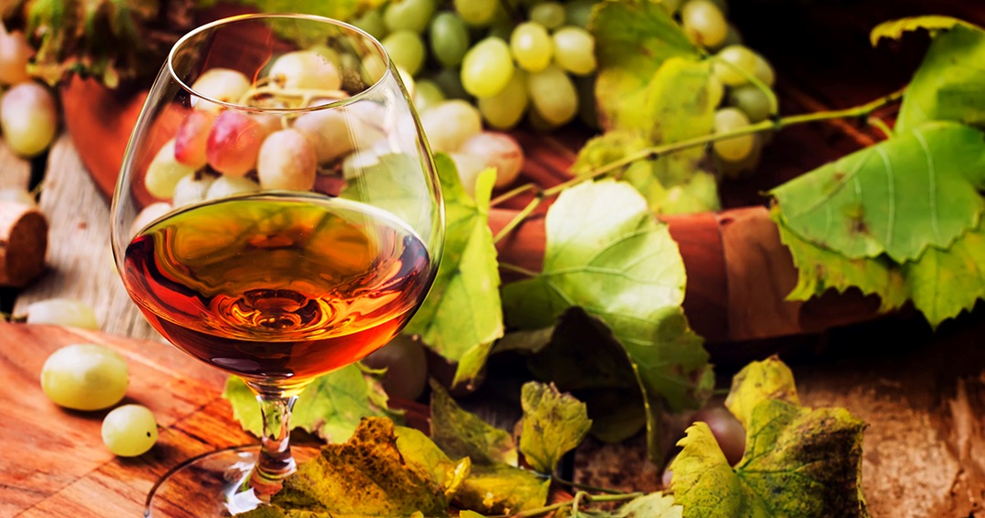 Cognacglas mit Trauben